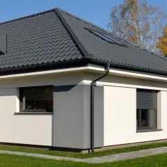 Jakie dachówki najlepiej sprawdzą się na dachu kopertowym - poradnik wyboru
